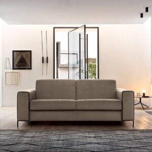 A Madison ágyazható kanapé is egy magas acél lábbakkal ellátott design kanapéágy.